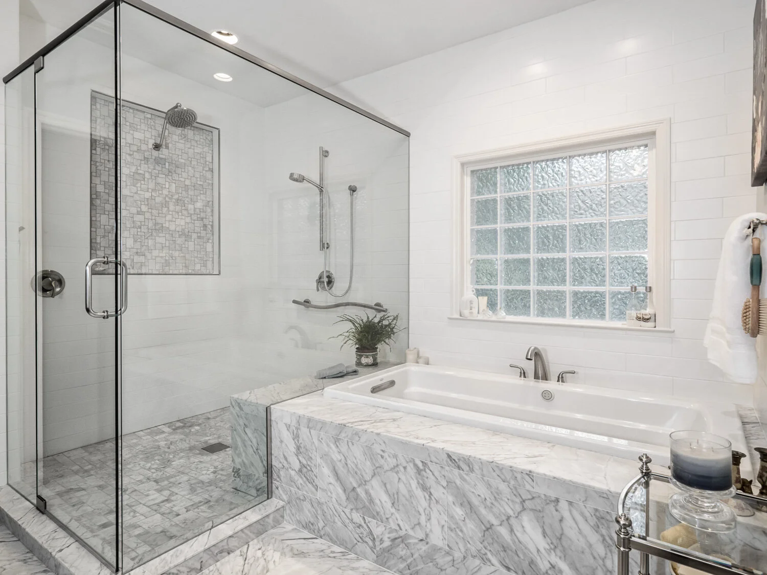 White marble tub surround with walk-in shower