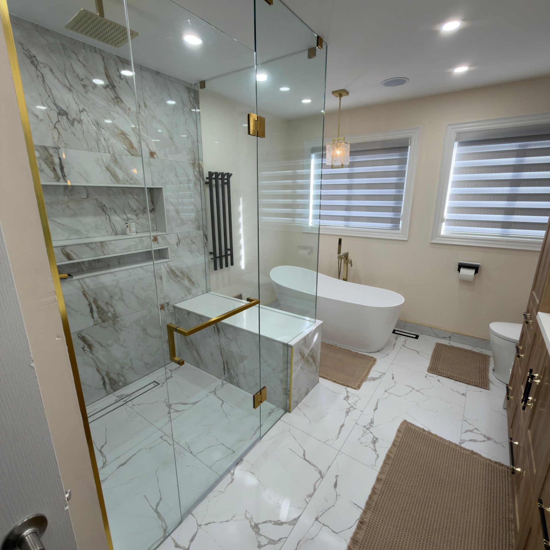 Luxury bathroom suite with bench shower